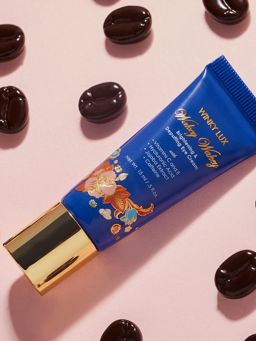 wakey wakey eye cream flat lay with coffee beans surrounding