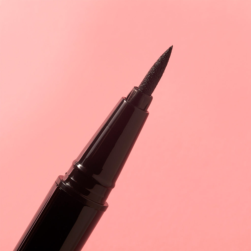 Line and Define Set -- meowza liquid eyeliner close up of felt tip on pink background