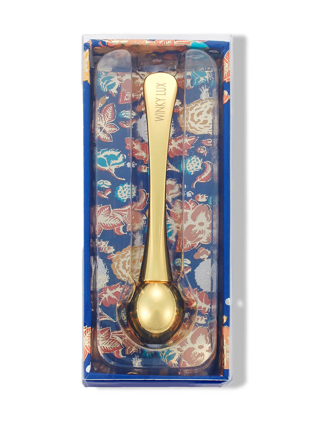 eye cream applicator in box on white background