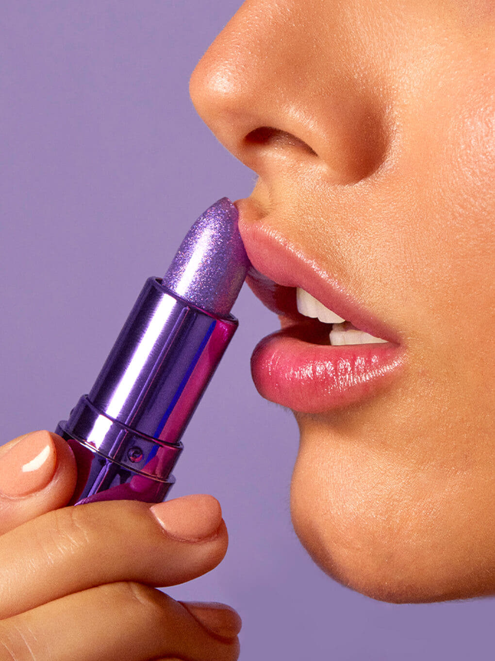 model side profile applying amethyst ph color changing lip balm